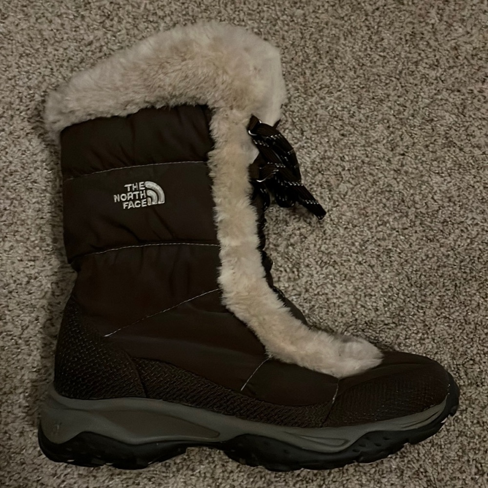 The North Face boots with the fur! Women’s size 8, only worn once.